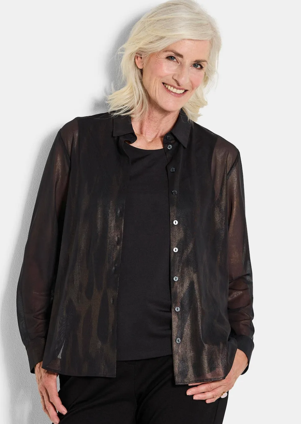 Bluse aus semitransparentem Mesh
