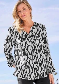 Druckbluse mit Tunikaausschnitt