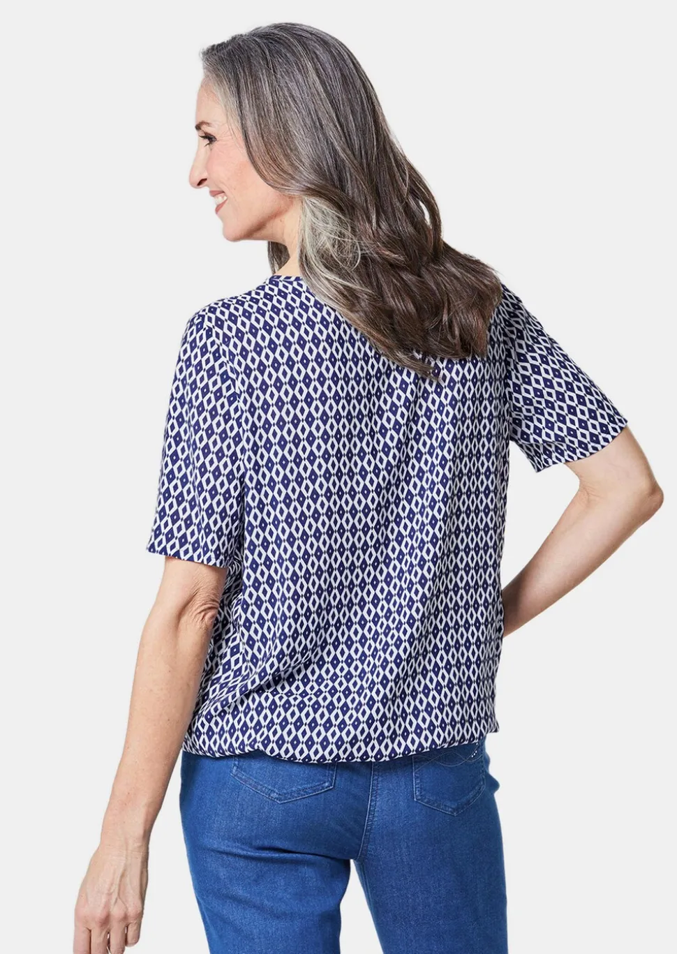 Farbbrillante Druckbluse mit liebevollen Details
