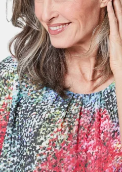 Farbbrillante Druckbluse mit liebevollen Details