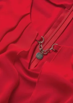 Festliche Bluse mit Chiffonüberwurf und Schmuckelement