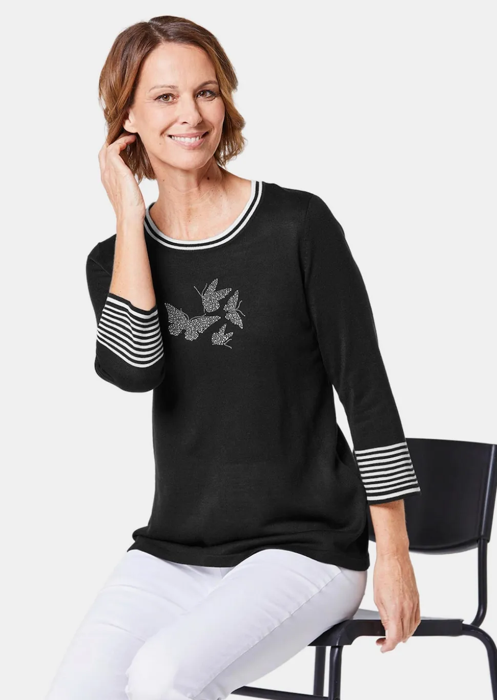 Pullover mit femininem Motiv