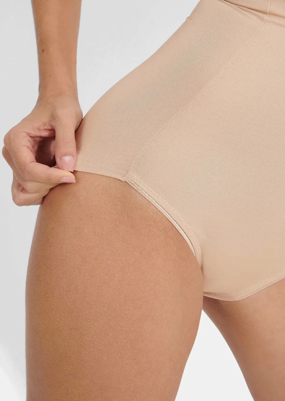 Taillenhohe, formende Miederhose
