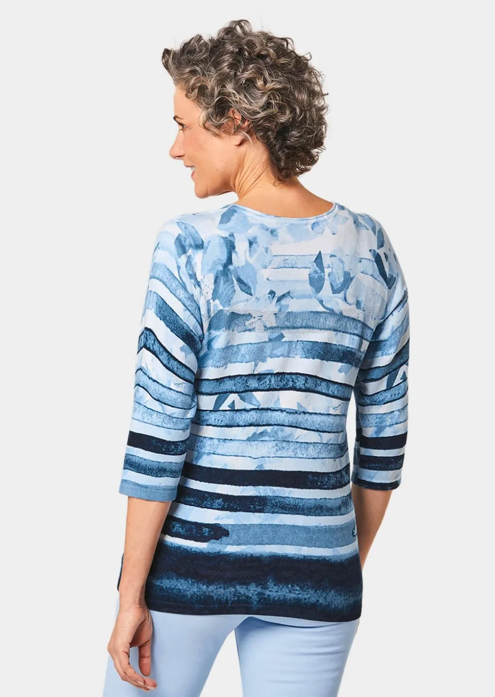 Unkomplizierter Druckpullover mit schimmernden Schmucksteinen